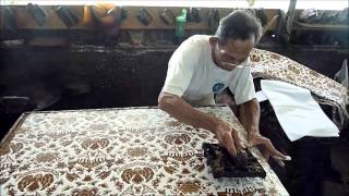 Batik making  Applying wax with a stamp [upl. by Lotz127]