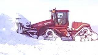 Case IH 535 QuadTrac Pushing Snow [upl. by Wolk738]