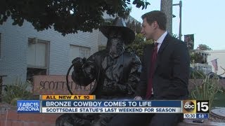 Bronze cowboy comes to life [upl. by Ydnerb]