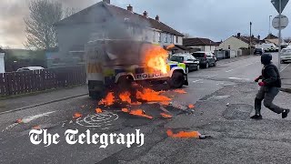 Police attacked with petrol bombs in Northern Ireland at illegal dissident Republican parade [upl. by Ear]