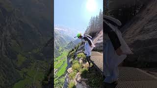 Epic Moment Hiker Captures Insane Wingsuit Flight Overhead shorts mountains mountains [upl. by Yeneffit]