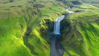 Flying Over Skogafoss Waterfall Iceland [upl. by Buskirk]