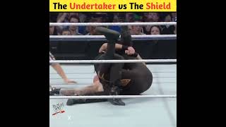 The Undertaker feels the brutal wrath of The Shield shorts wwe [upl. by Haggai57]