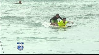 Surfers lifeguards give joy to those with special abilities [upl. by Lulita]