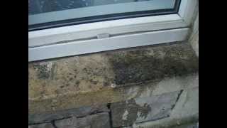 2 of 3 Facade Cleaning removing pollution staining drom a sandstone window sill [upl. by Artemisia289]