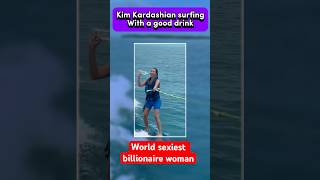 Kim Kardashian surfing with a blended drinks🏄‍♀️World sexiest billionaire woman❤️shorts [upl. by Elpmet152]