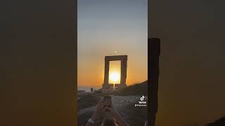 WATCHING THE SUNSET THROUGH THE TEMPLE OF APOLLO IN NAXOS GREECE shorts [upl. by Kyriako60]