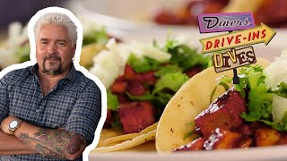 Guy Fieri Eats Some OUTSTANDING Tacos Al Pastor  Diners DriveIns and Dives  Food Network [upl. by Byran926]