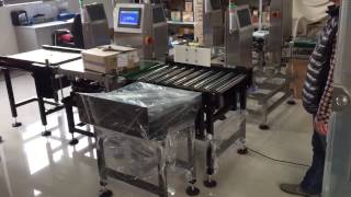 zegoo inmotion carton checkweigher with roller conveyor amp pusher rejector [upl. by Loree]