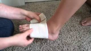 Applying a Figure 8 Elastic Bandage to an Ankle [upl. by Malti288]