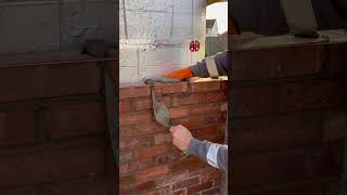 bricklayers bricklayer laying bricks  buttering mortar [upl. by Rehpotsyrhc684]