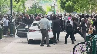 Car drives through crowd as PSU protesters move through downtown Portland [upl. by Chrisoula]