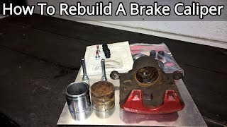 How To Rebuild A Front Brake Caliper  Complete Guide [upl. by Hanselka]