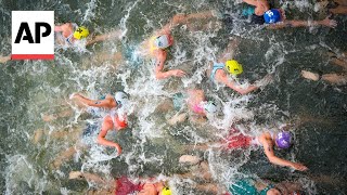 Triathlon kicks off on Day 5 at Paris Olympics  AP Top Photos [upl. by Cutty403]