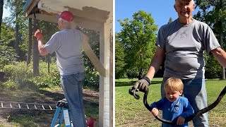 Enormous black snake gets pulled out of homes gutter [upl. by Lauralee]