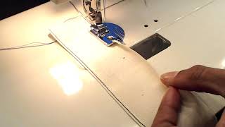 How to Use a Roll Hemmer Presser Foot  FashionMadeLive [upl. by Aysan699]