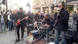 Street band FunFiction outside Oxford Circus stn London  singing Rolling Stones Under My Thumb [upl. by Benn]