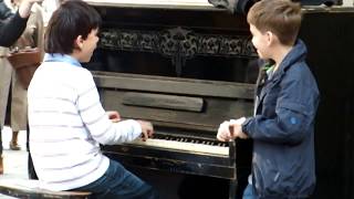 Piano prodigy kid performing on quotSession streetquot in Lviv [upl. by Morell]