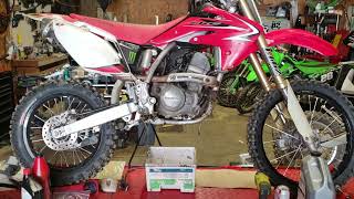 How to change the oil in a Honda CRF150R [upl. by Edrei]