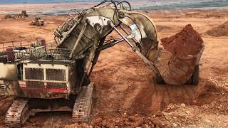 Terex RH170 Face Shovel Excavator Loading Terex TR100 Dumpers [upl. by Aicatsue]