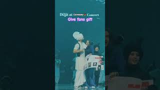 Diljit Dosanjh at Germany Concert distribute gift to fans diljitdosanjh trending shorts ytshorts [upl. by Bowes]