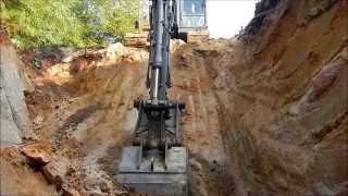 Excavator Digging A Borrow Pit [upl. by Abrahamsen]