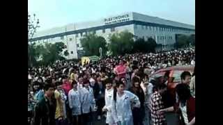 China Labor Watch 6000worker strike in Flextronics Shanghai 1 [upl. by Ardnekal84]