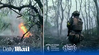 Ukraine 24th Brigade raid Russian trench near Bakhmut in firstperson footage [upl. by Nylrahs]