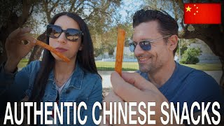 We Try 5 AUTHENTIC Chinese Snacks [upl. by Sremmus]