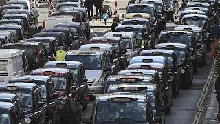 London cab drivers protest against taxi apps [upl. by Bixler]