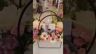 Simple paper bag arrangement with fresh flowers and Patchi chocolate [upl. by Nevada]