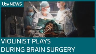 Patient plays violin while undergoing brain surgery in UK first  ITV News [upl. by Cornwall]