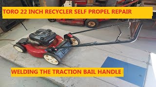 Toro 22 Inch Recycler Self Propel Repair  Welding The Traction Bail Handle [upl. by Ardelia185]