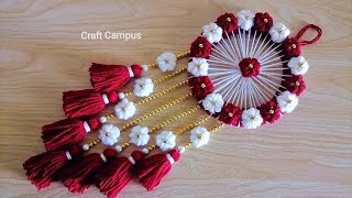 Super Easy Woolen Flower Wall Hanging Craft  Woolen Thread Craft Ideas  Woolen Wall Hanging Design [upl. by Locke]