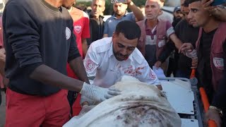 Gaza medic realises dead body is his mother killed in Israeli strike [upl. by Olga392]