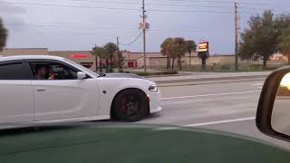 Trackhawk Vs Hellcat Charger while the road was wet 😬 [upl. by Idid264]