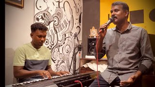 Tamil Christian song  Manadhurugum Dheivame yeasaya cover [upl. by Noizneb]