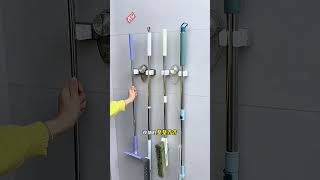 Install a suction cup mop clip behind the bathroom door so that the mop and broom can be stored [upl. by Tomasine]