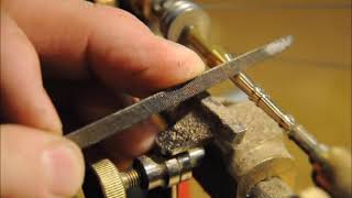 how to use a watchmakers lathe for turning a miniature brass canon out of old 5 lever brass key [upl. by Sexton650]