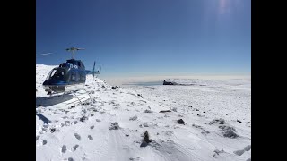 Helicopter flight over snow on the Amphitheatre in the Drakensberg [upl. by Bette-Ann705]