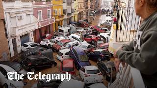 Spain flash floods Dozens dead as cars pile up in Valencia [upl. by Seth]