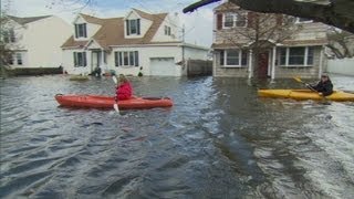 New York residents return to flooded homes [upl. by Ecilegna195]