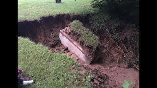 Caskets burial vaults exposed by flooding in Cass County Michigan [upl. by Karola907]