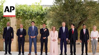 G7 leaders pose for photographers as they prepare to tackle global issues [upl. by Ariane710]