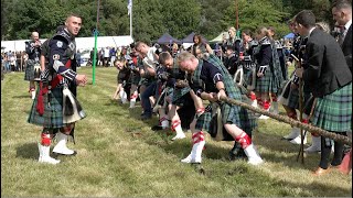 Tug o War competition with Ballater Pipe Band v audience during 2023 Tomintoul Highland Games [upl. by Nidnarb]