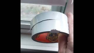 cheap quick fix drafty vinyl windows vinyl window draft fix white gorilla tape  not an advert [upl. by Elleon]