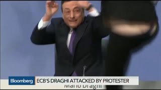 Mario Draghi Showered With Shouts Confetti in Protest [upl. by Bevin781]