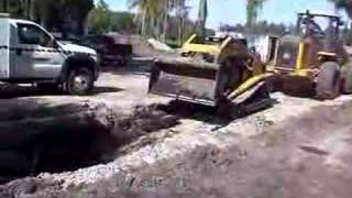 John Deere Loader pulling ASV RC100 out of the mud [upl. by Yelekreb221]