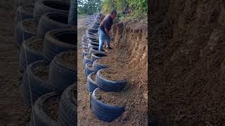 Slope protection building process with tires [upl. by Anyah467]