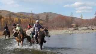 Mongolian Horseback Riding  Stone Horse Expeditions and Travel  Crossing the Terelj River [upl. by Othelia284]